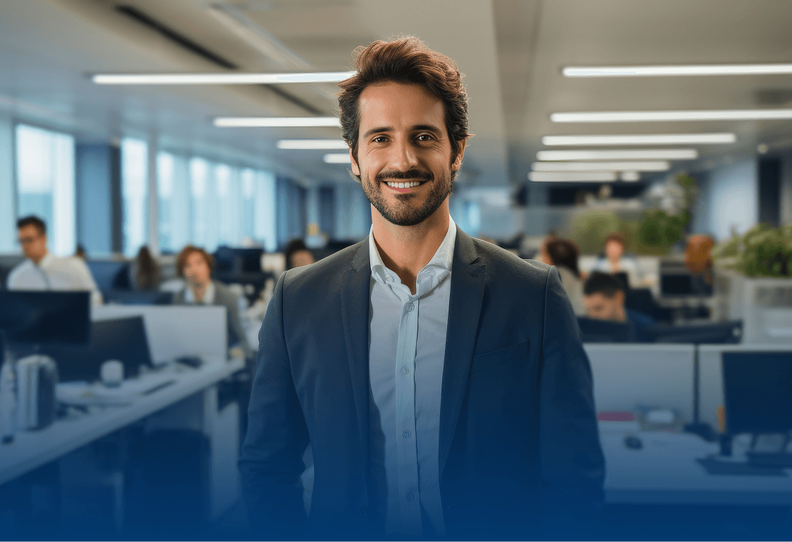 Man smiling in office having photo taken