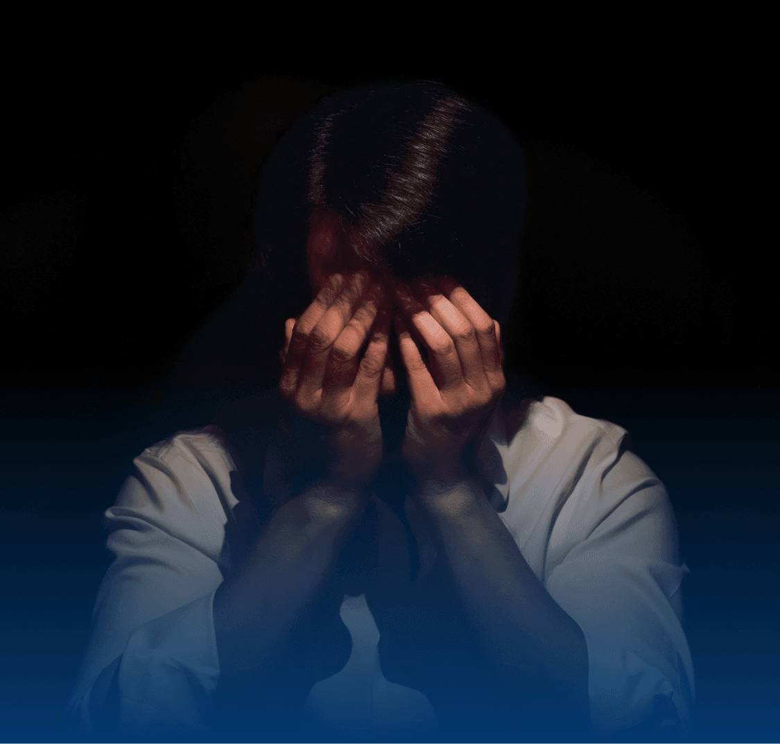 Asian depressed man sitting and sobbing alone